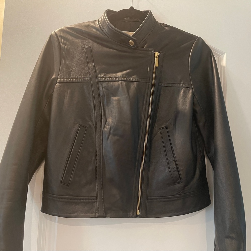 Michael Kors, vegan leather jacket with gold zipper.Only used few times.